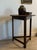 A well-proportioned antique English cricket table, dating to the early 20th century, with its classic round top set over a...