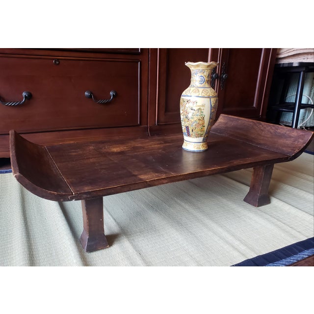 A beautifully crafted authentic Antique Chinese Kang table in solid Northern Elm (Yumu), dating to the late Qing Dynasty....