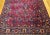 A very rare gallery-size Persian "Manchester" Kashan in an allover design set in a medium burgundy field color with a...