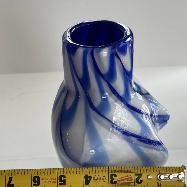 Beautiful vintage Italian art glass vase depicting a stylized female bust, crafted in the classic Murano style. Featuring...