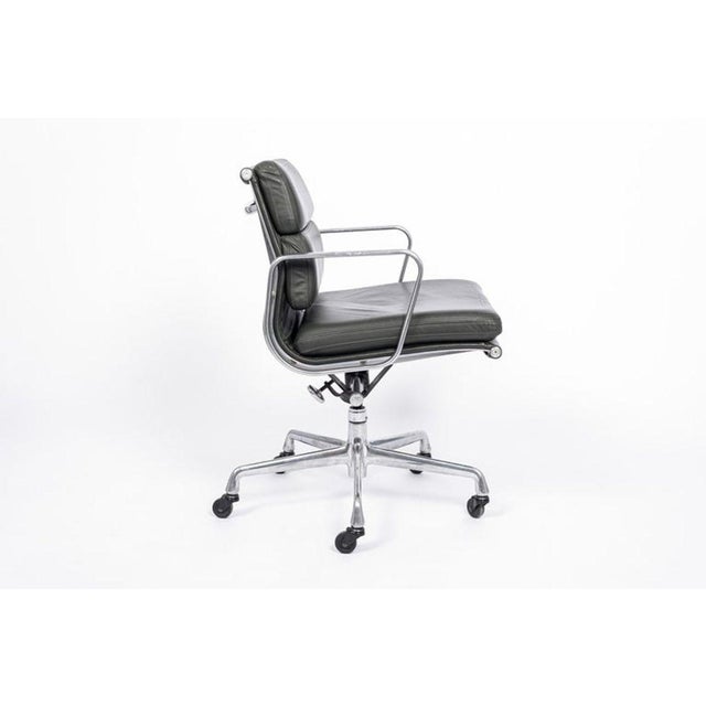 This authentic Eames for Herman Miller Soft Pad Management Height gray leather office chair from the Aluminum Group...