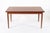 This exceptional vintage mid century Danish modern extendable teak dining table was designed by Kai Kristiansen for Korup...