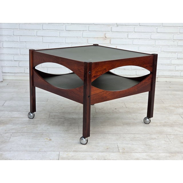 1970s, Danish design by Kristian Vedel. Side table model "Modus". Teak wood, chrome steel wheels, aluminum top and shelf....
