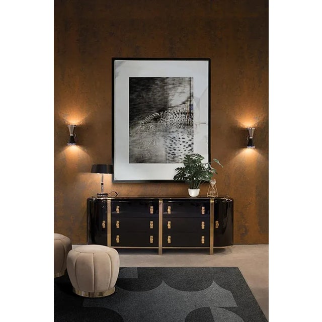 with a flair for the dramatic as the director whose name signs the piece, this handmade Tarantino rug is a full-blown hand...