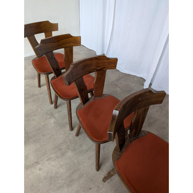 Vintage dine chairs were made by Mundus Florijan Bobić in Varaždin, former Yugoslavia in the 1970s. Some of the chairs...