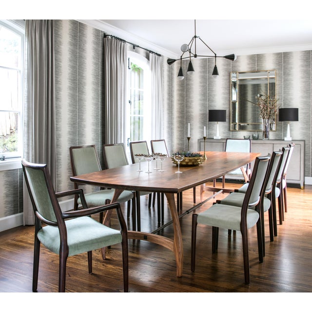Custom solid walnut dining table designed by Luxe Gold List designer Niche Interiors. Fabricated locally in San Francisco...