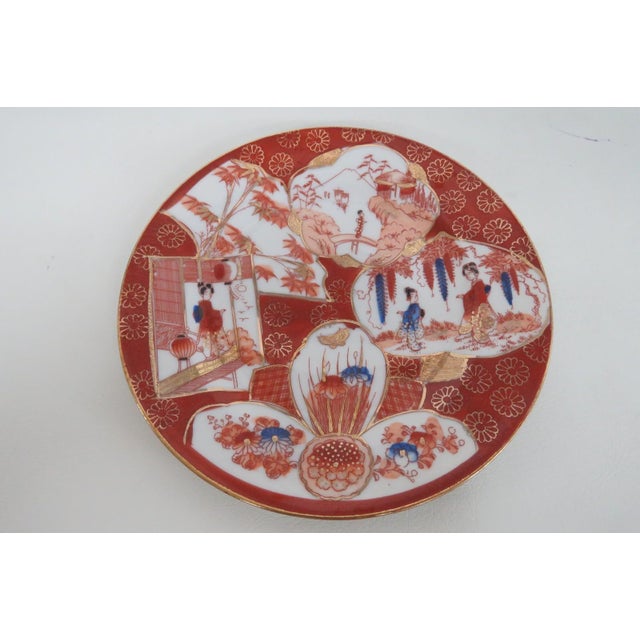 This beautiful Set of 3 Plates is made of porcelain. These three matching plates feature various images of Geishas in...