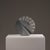 For sale is an extraordinary, abstract stone sculpture. This handcrafted art piece features a geometric-organic disc shape...