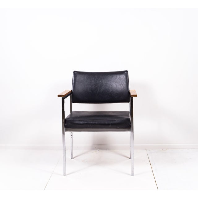 Rare Black Thonet chair, build out of chrome and leatherette and Wooden Armchair. This piece has an attribution mark, I am...