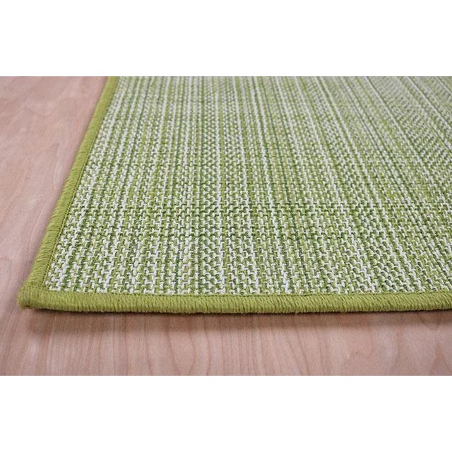 Loggia is a beautiful indoor/outdoor rug made of 100% polypropylene. The mix of bright greens creates a wonderful pop of...
