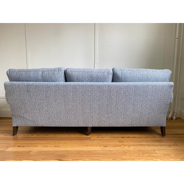 This vintage Baker sofa has been newly re-upholstered in Thibaut fabric. The piece features all new fabric and cambric,...