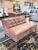 A sophisticated Mitchell Gold + Bob Williams leather bench settee that blends clean architectural lines with the warmth...