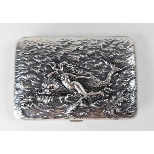 We are selling this great cigarette case by Battin & Co. of New Jersey. This small case has heavily modeled face with a...