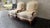 A rare and gorgeous pair of French Provincial Louis XV-style upholstered lounge chairs, crafted by Baker Furniture in the...