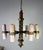 This six-light chandelier is a striking example of rustic, hand-forged craftsmanship with a bold, geometric silhouette....