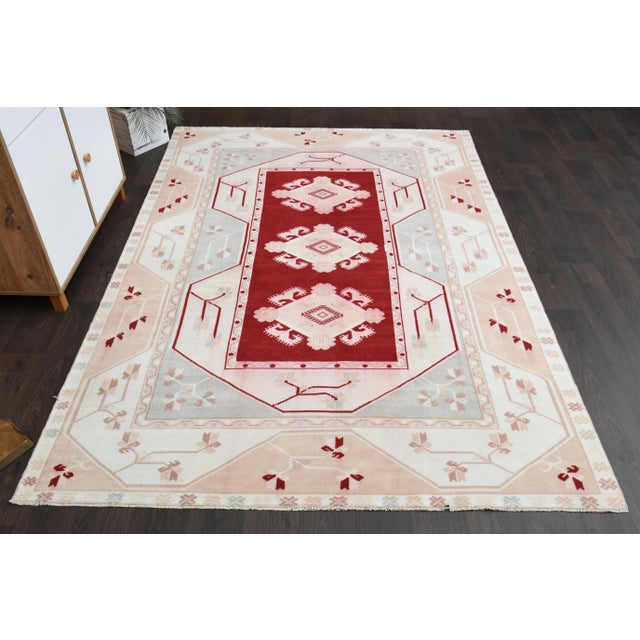 Vintage Turkish Hand-Knotted vintage rug is a semi-antique vintage area rug.'70s Eastern region of Turkey's unique rug is...