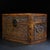 A beautifully crafted Chinese hardwood box, likely made of Huali (rosewood), featuring intricate relief carvings...