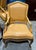 Pair of Louis XV style bergeres from William Switzer. These arm chairs have elegant, rounded backrests, molded wood...