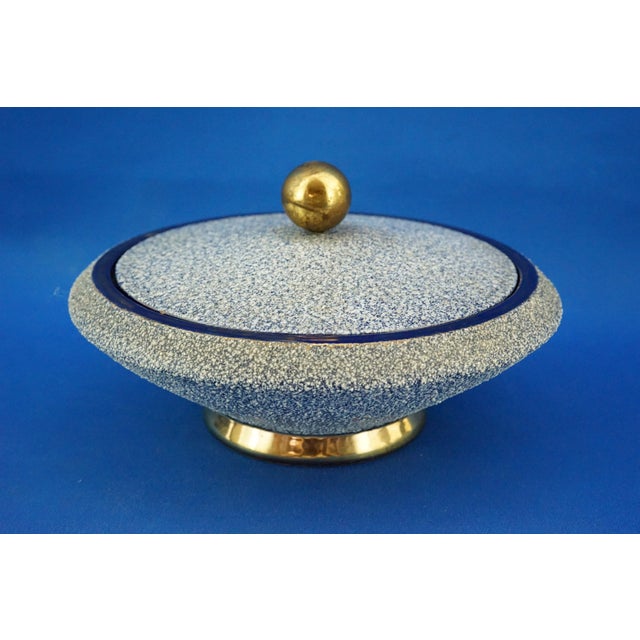 Item description: Delightful majolica ceramic box, entirely hand-crafted on a potter's wheel and featuring a gilded bronze...