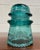 This is a gorgeous aqua or teal vintage glass Hemingray insulator. “Hemingray-16.” Made in the U.S.A. Has some chips, as...
