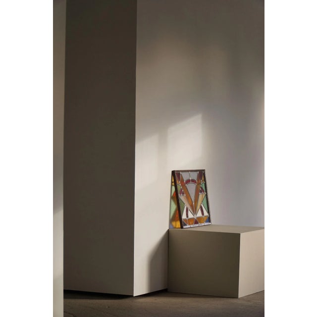 A decorative glass wall art piece. A colorful plate in many variations that gives a magical atmosphere when light falls...