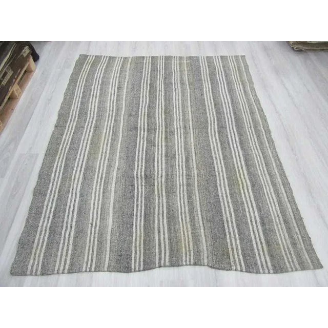 Handwoven vintage striped kilim rug from Adana region of Turkey.In very good condition