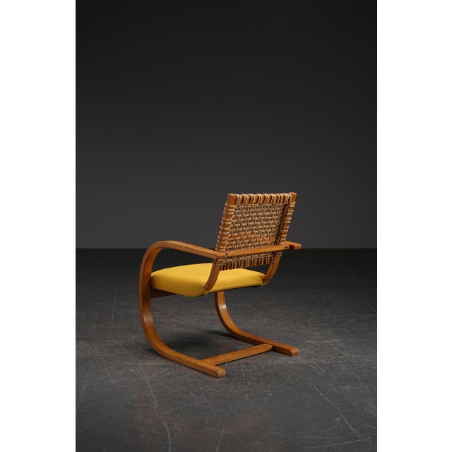 period: 1940s origin: The Netherlands dimensions: h90 x w61.5 x d64 cm (sh43 / ar63 cm) material: vintage upholstery,...