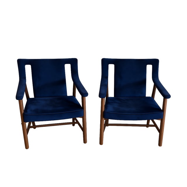 Exceptional pair of mid-century modern lounge chairs designed by Ludvig Pontoppidan in Copenhagen, Denmark. These...