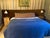 Custom Wall to Wall Velvet Headboard and Walnut King Sized Bed Frame For Sale - Image 12 of 13
