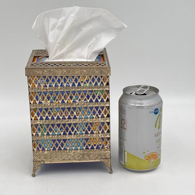 Mid-century Hollywood Regency tissue box cover featuring a gold filigree ormolu design. This square cover measures 6 1/2"...