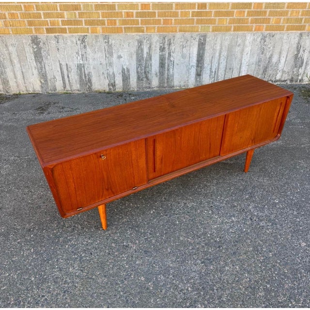 Vintage Danish Sideboard in Teak by E.W. Bach for Sejling Skabe, 1960, in Very Good conditions. Designed 1960 to 1969 This...