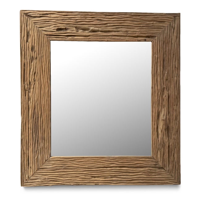 Beautiful reclaimed teak wood mirror with hand carved deep wood texture and grain. A perfect addition to a rustic, organic...
