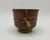 This is a vintage studio pottery yunomi or Japanese teacup by Eric Norstad (Bay Area California). The teacup is...