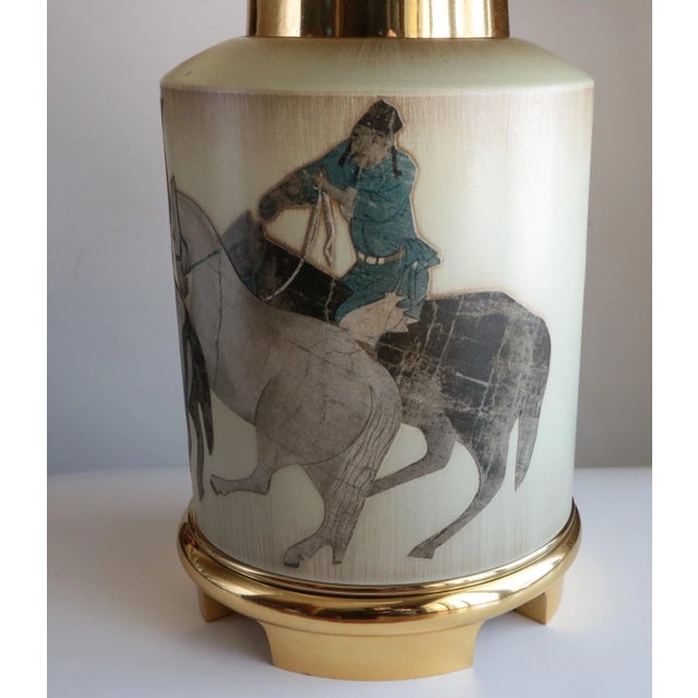 This vintage table lamp has a wraparound collage featuring a work attributed to Han Gan (c. 706–783), a Chinese painter...