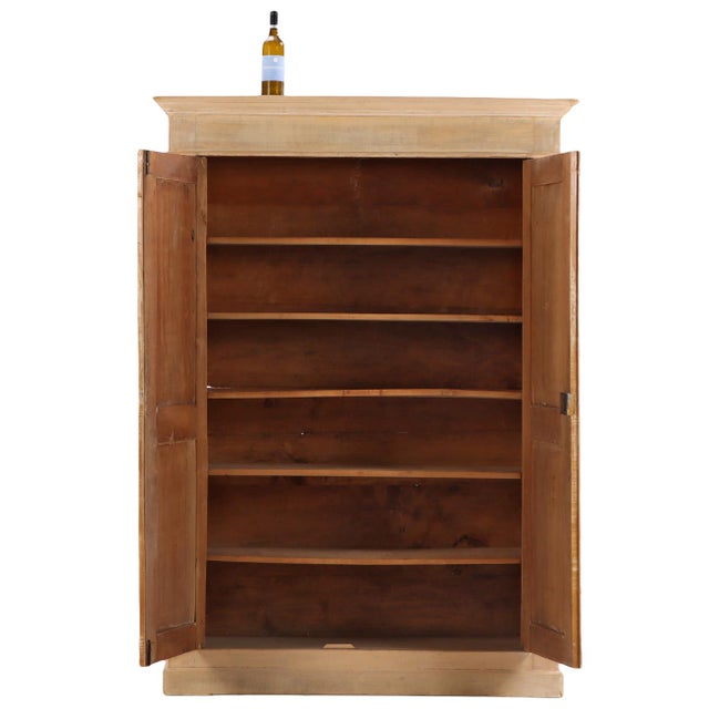 Constructed in two sections comprising an upper and lower case for ease of transport and installation, the armoire...