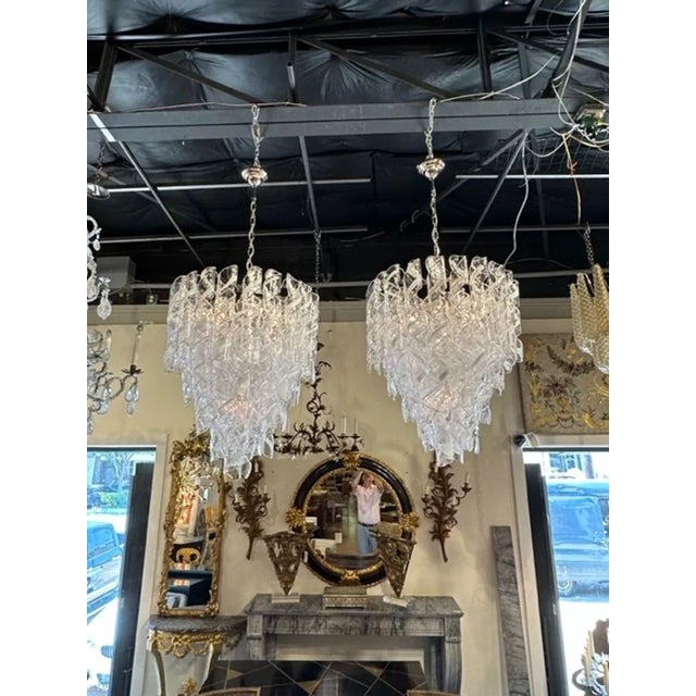 Modern pair of Murano spiral tube glass waterfall chandeliers. These chandeliers has been professionally rewired, comes...