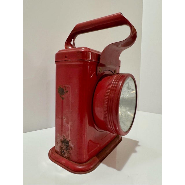 Vintage Lightmaster lantern searchlight in red painted metal, marked No. 20-4803 and “throws a beam more than 1500 feet.”...