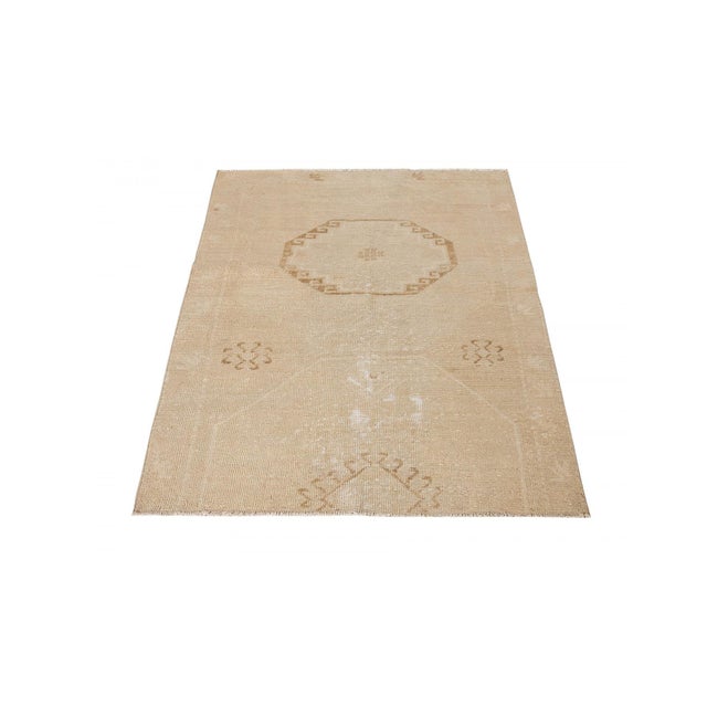 Decorative washed out handknotted vintage rug from Konya region of Turkey. Approximately 50-60 years old. In very good...