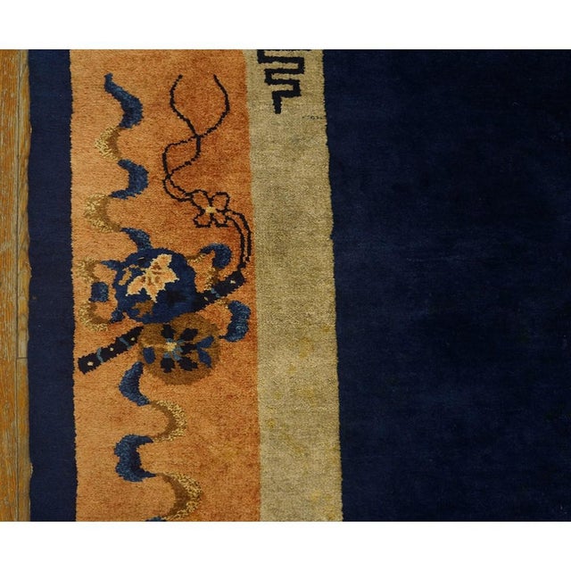 Antique Peking Room Size Wool Blue Navy, Yellow / Gold / Orange Rug, Circa Date: 1920s. This magnificent example of...