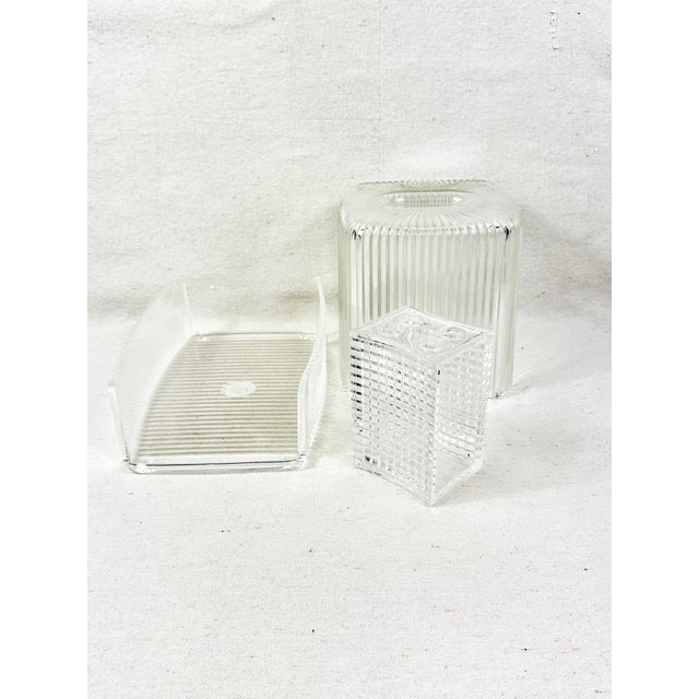 Add a touch of classic mid-century modern glamour to your bathroom vanity with this stunning 3-piece vintage clear lucite...