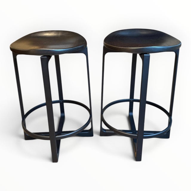 Swivel barstools from luxury furniture maker Holly Hunt. The Pepper Counter Stool brings sleek and innovative style to...