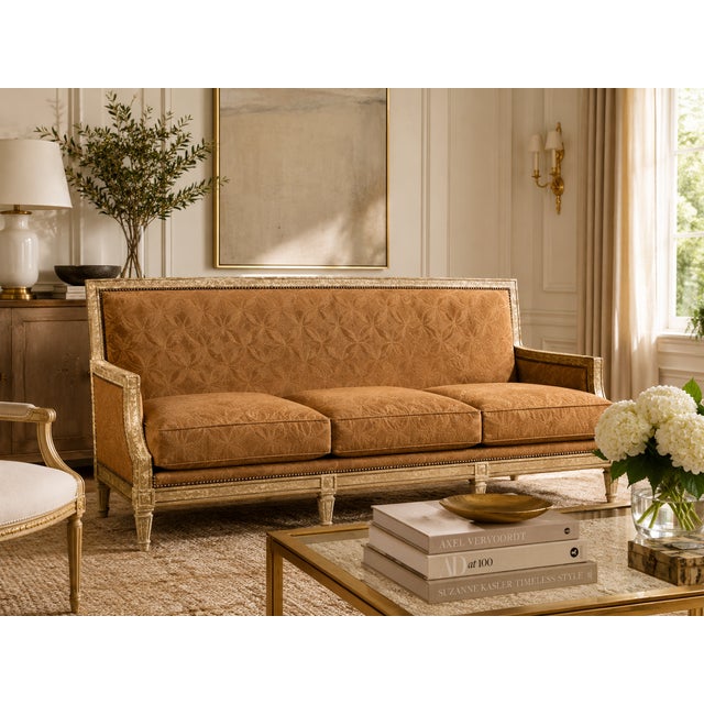 An elegant vintage sofa by Wesley Hall featuring a beautifully distressed painted frame with tailored neoclassical lines...