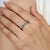 This Certified 2.3 Ct Natural Emerald Milgrain Eternity Band Ring showcases a beautiful continuous arrangement of natural...