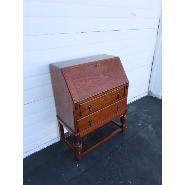 This Secretary Desk is made out of wood, solid wood, solid oak, and leather. This Secretary Desk has a Traditional style...