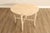 Decorative Round Accent Table Featuring a Beige Marble Top Raised on a Hand Carved Faux Bois Style Wooden Base. The Base...