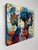 Two Worlds Apart by Jon Wassom | Mixed Media on Panel of two silhouetted profiles For Sale