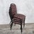 a characterful set of four mid-century stacking dining chairs with slender tubular metal frames and colourful seats. Their...