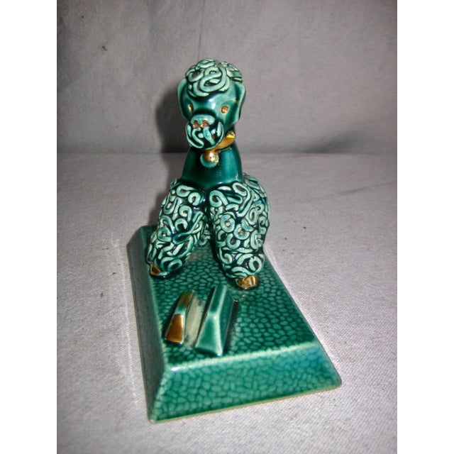 Strong in style this lovely figurine from circa 1950 in the shape of a poodle where very popular at the time and are still...