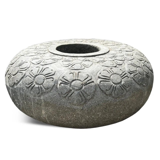 Beautiful Java round stone carved pot with charming repeating floral pattern. Solid heavy handmade piece from Indonesia...