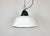 Industrial hanging lamp manufactured by Szarvasi Vas - Fém in Hungary during the 1960s. It features a white enamel shade...